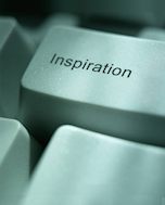 Computer key with the word inspiration on it